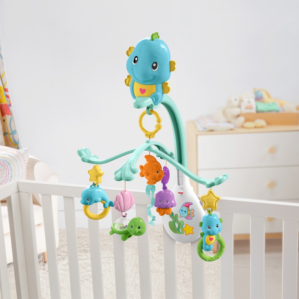 fisher price cot activity centre